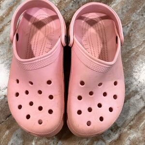 Light Pink Crocs.  I’m good condition just a little dirty. Size 10
